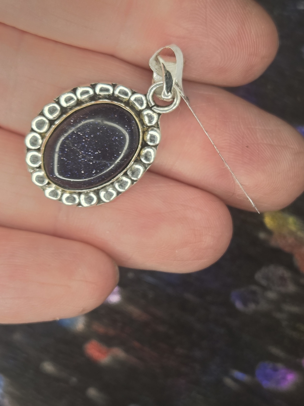 Silver Over Copper-Oval Blue Goldstone Pendant with Decorative Frame Black Onyx